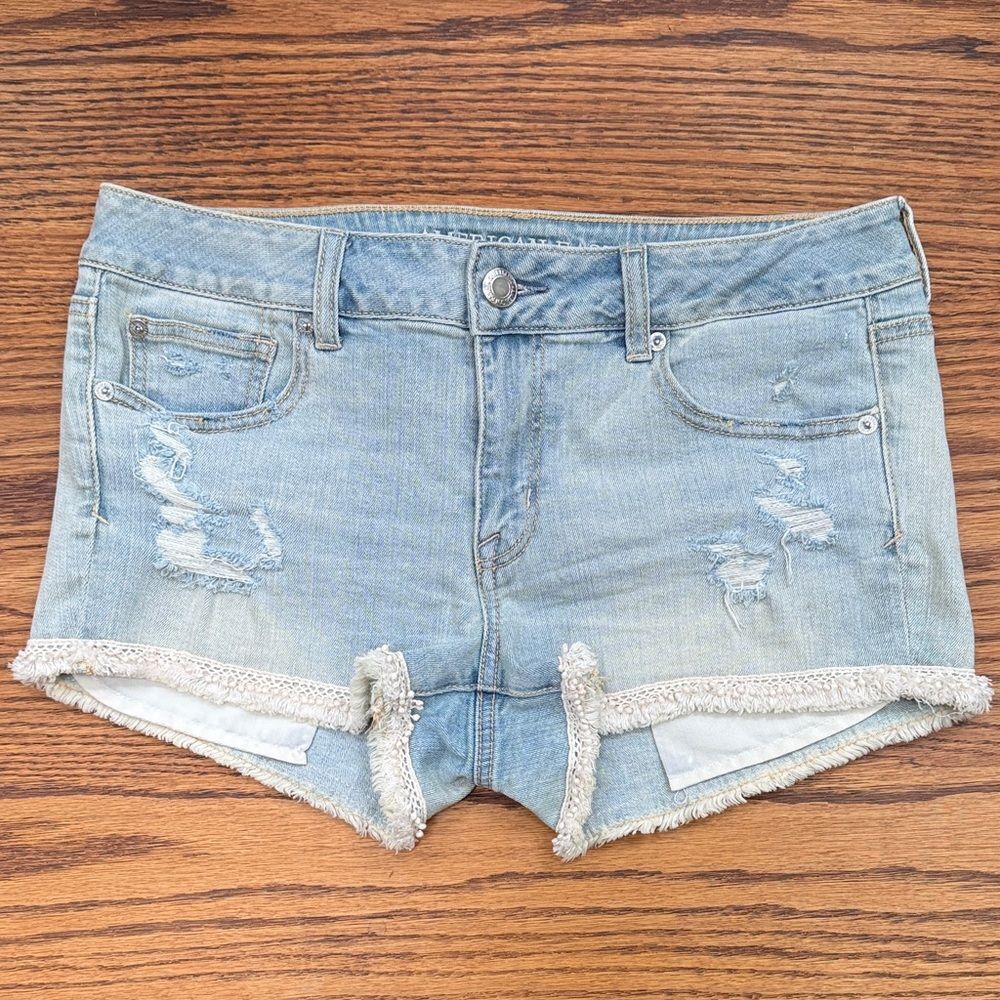 American Eagle Outfitters Distressed Blue shortie Jean Shorts.  Waist 32 in